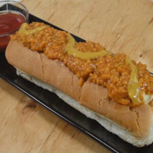 Chilly Paneer Hot-Dog with spicy paneer filling, sauces, and soft bun