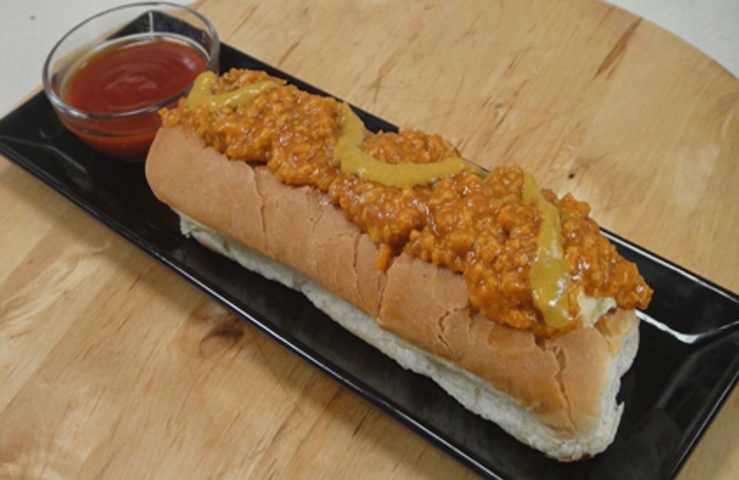 Chilly Paneer Hot-Dog with spicy paneer filling, sauces, and soft bun