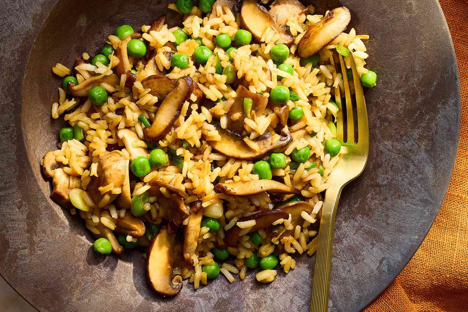 Mushroom fried rice with vegetables stir fry Indo Chinese mushroom rice dish Fried rice with mushrooms and sauces Street style mushroom fried rice