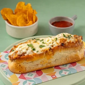 Paneer Hot-Dog with soft bun, paneer filling, cheese, and sauces